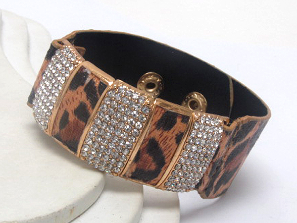 Synthetic leather animal print and crystal metal patern and button bracelet