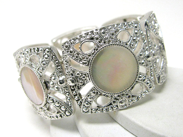 Mother of pearl round disk marcasite style metal stretch bracelet