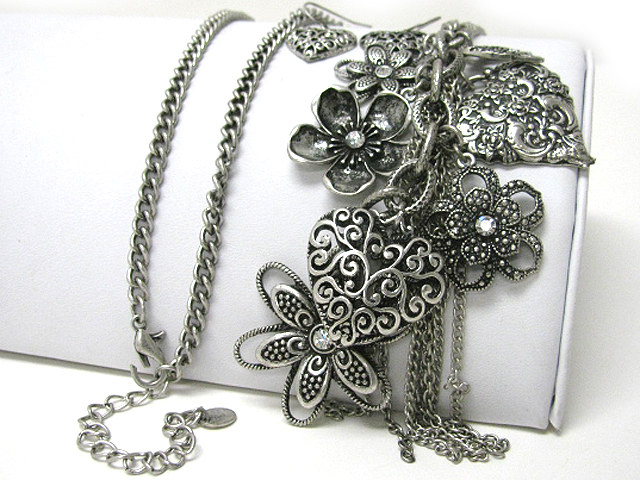 Multi flower and tassel long multi chain necklace earring set