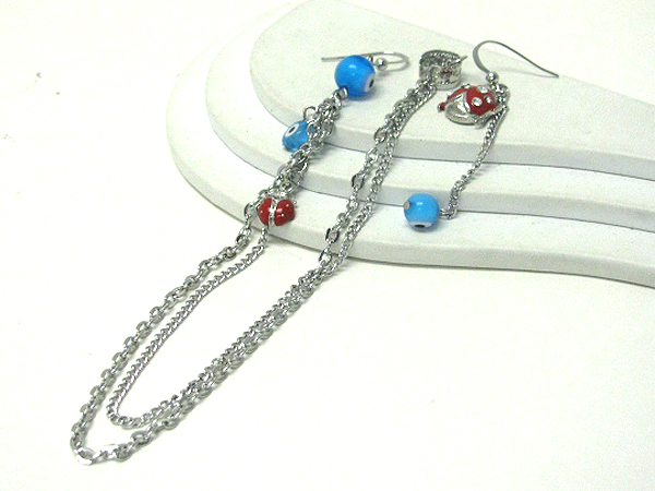 6 inch drop long earrings - lady bug and evil eye deco