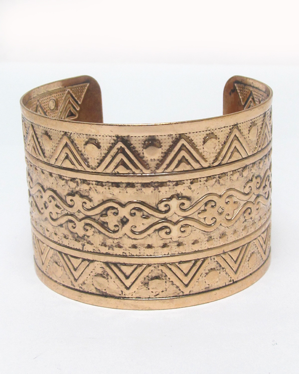 Metal filigree textured cuff bracelet