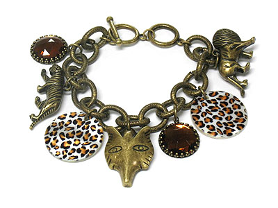 Antique style animal print shell disk and charm toggle bracelet