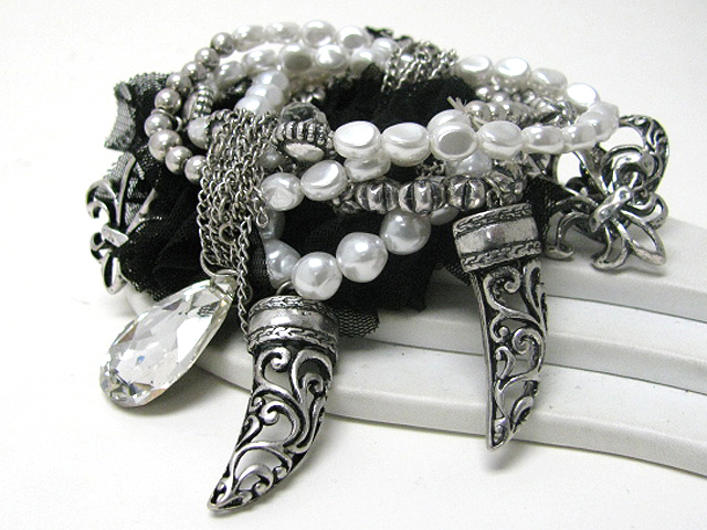 Crystal and tusk charm multi row beads and chiffon stretch bracelet