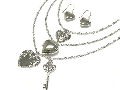 Multi layer metal heart charms necklace and earring set 