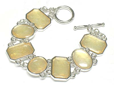 Metal disk link toggle bracelet