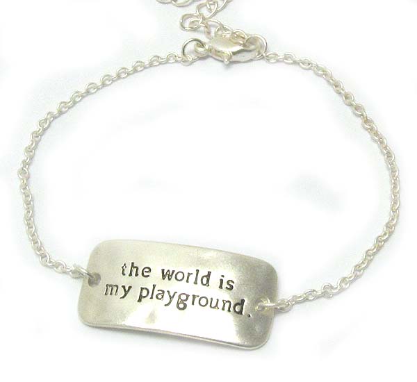 Message on hammered and curved metal plate bracelet - the world is my playground