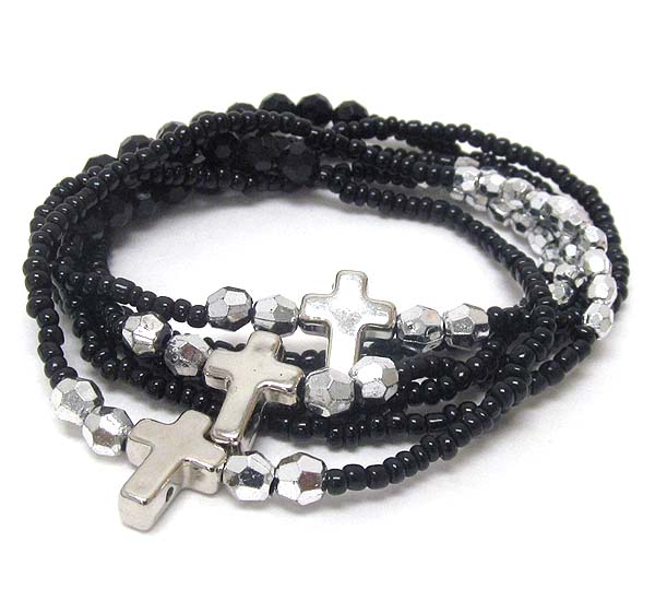 Metal cross and multi layered stretch bracelet