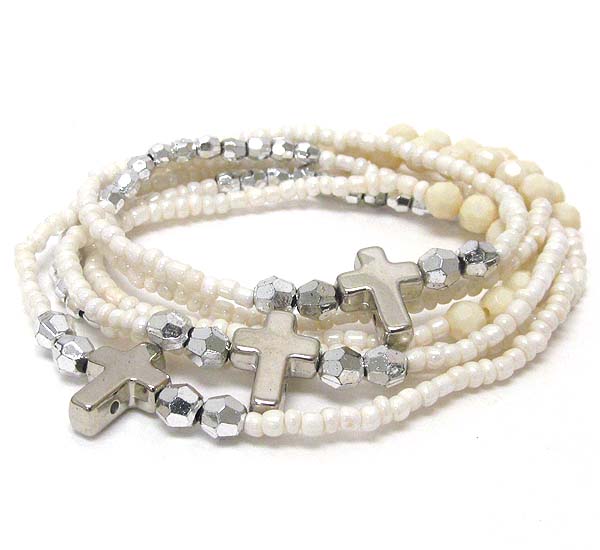 Metal cross and multi layered stretch bracelet