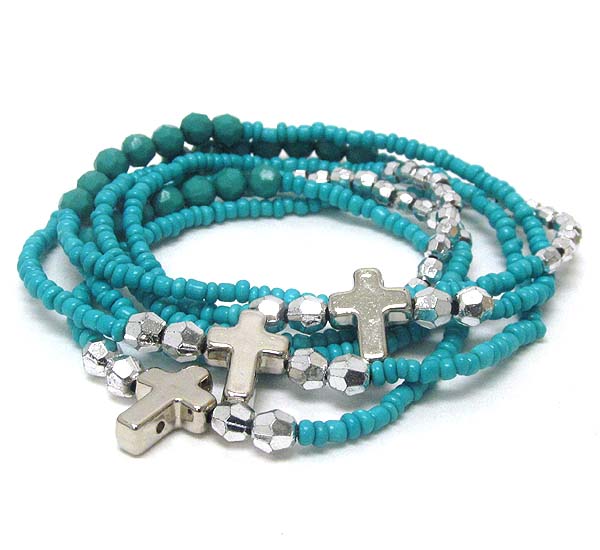 Metal cross and multi layered stretch bracelet