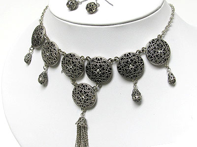 Filigree round metal disk and long tassel drop necklace and earring set