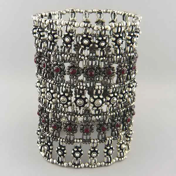 Extra tall crystal metal flowers and multi metal seed beads stretch bracelet