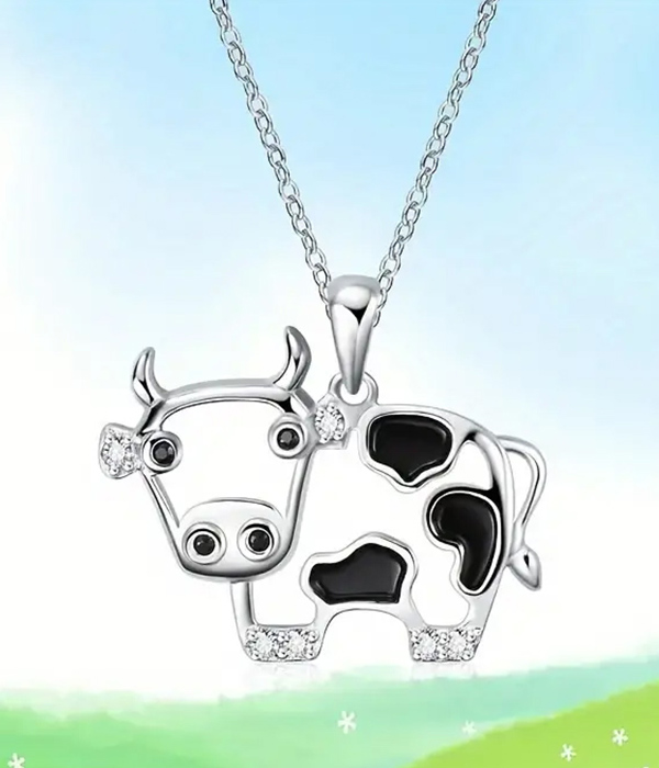 Cow pendant necklace