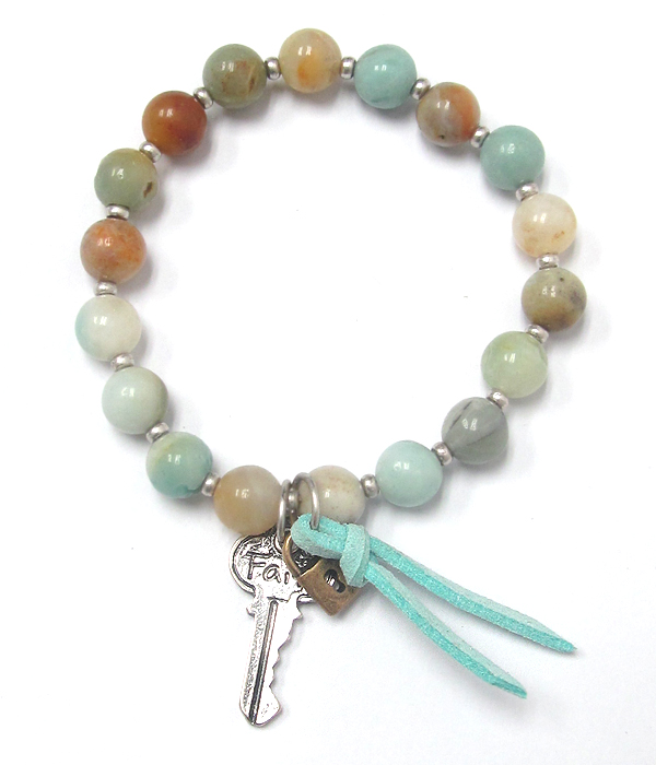 Key of faith charm and ball stone stretch bracelet