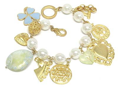 Multi casting metal charms and pearl bead toggle bracelet 