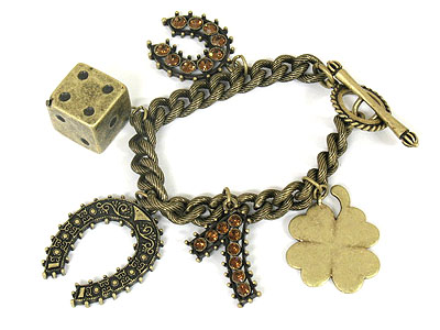 Antique gold crystal horse shoe and dice and lucky seven clover charm toggle bracelet