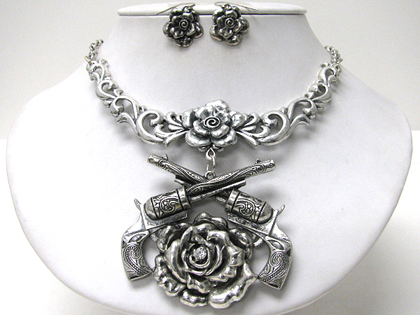 Metal guns and rose pendant necklace earring set