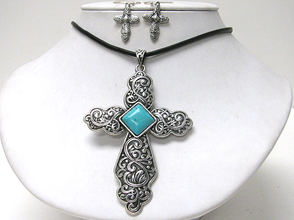 Turquoise center metal filigree cross pendant and cord necklace earring set