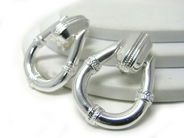 Curved metal clip earrings