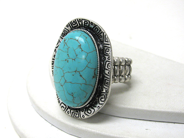 Oval turquoise and metal casting stretch ring