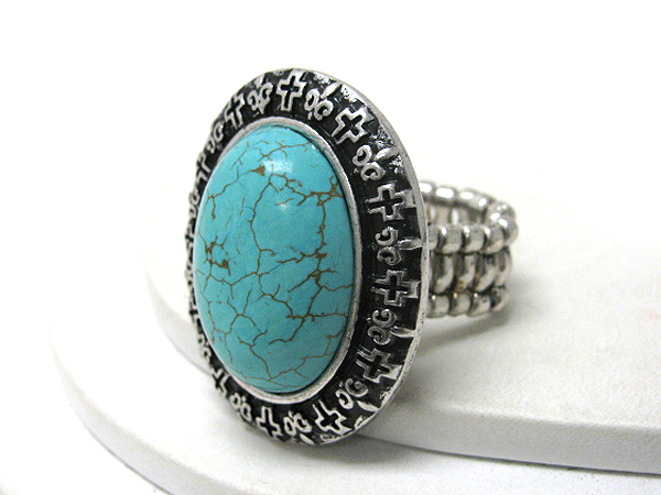 Oval turquoise and metal casting stretch ring