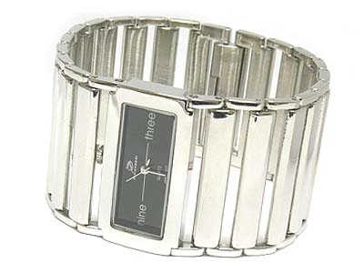 Designer inspired wide metal band watch