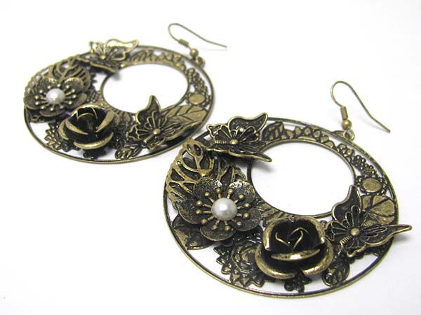 Metal art disk butterfly and flower earring