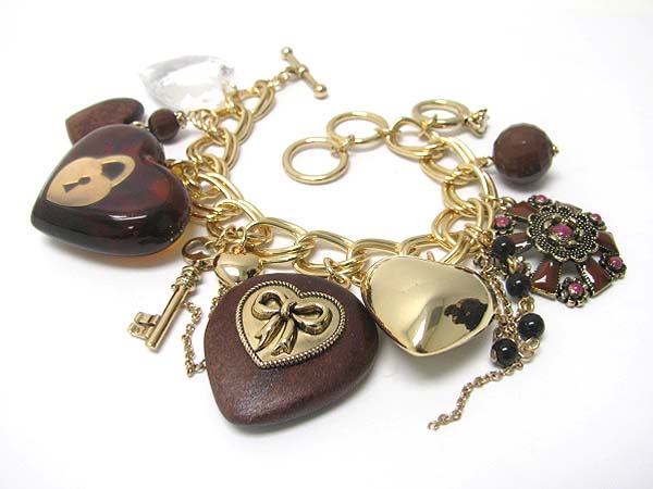 Heart and mixed antique looks charm toggle bracelet