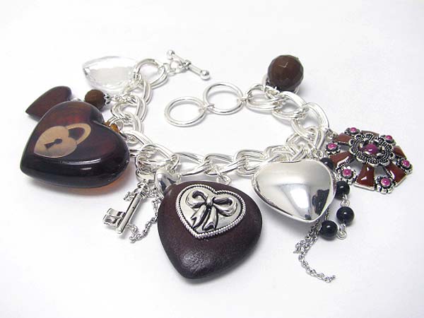 Heart and mixed antique looks charm toggle bracelet