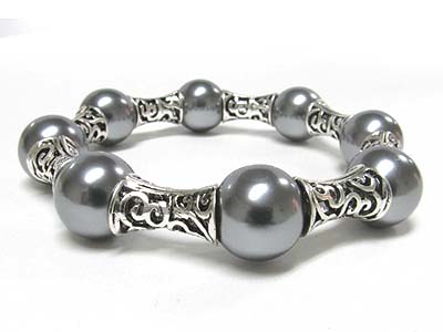 Pearl ball and meal filigree joint stretch bracelet