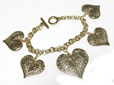 Metal filigree heart charms dangle toggle bracelet