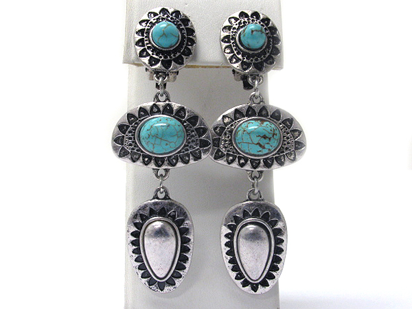 Metal casting and turquoise deco triple drop clip earrings