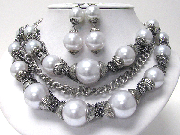 Pearl and mixed metal chain tangle necklace earring set