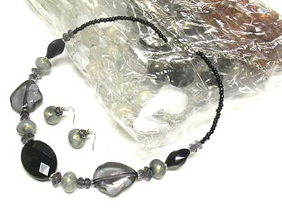 Dozen opaque and clear acryl necklace and earring set  mens jewelry