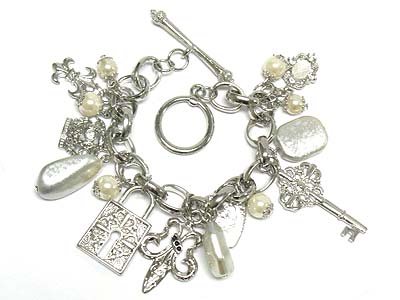 Metal and patina and crystal deco multi charms chain bracelet