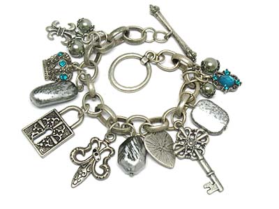 Metal and patina and crystal deco multi charms chain bracelet