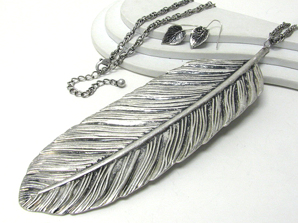 Large metal leaf pendant and long metal chain necklace earring set