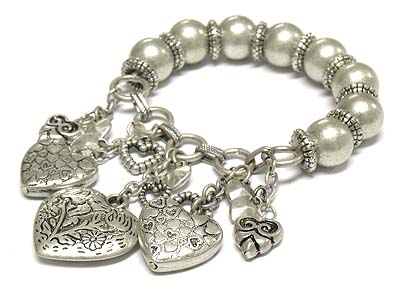 Burnish silver filigree heart dangle stretch bracelet