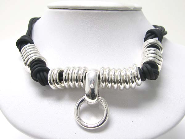 Casting metal ring and tied multi cord necklace