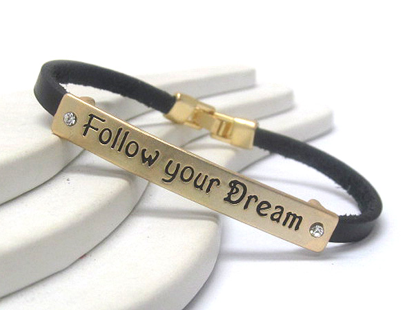 Synthetic leather with crystal on message follow your dream