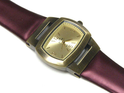 Burnish metal and leather band fashion watch