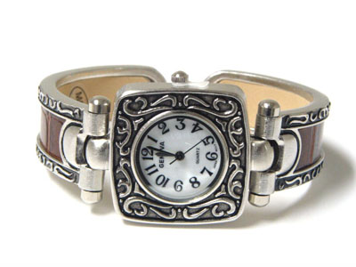 Antique look burnish metal and leather bangle watch