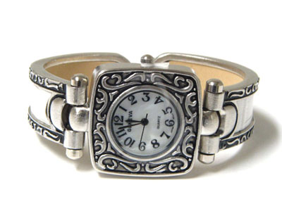 Antique look burnish metal and leather bangle watch