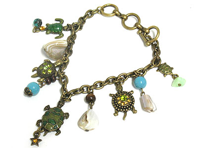 Multi sea turtle and shell charm toggle bracelet