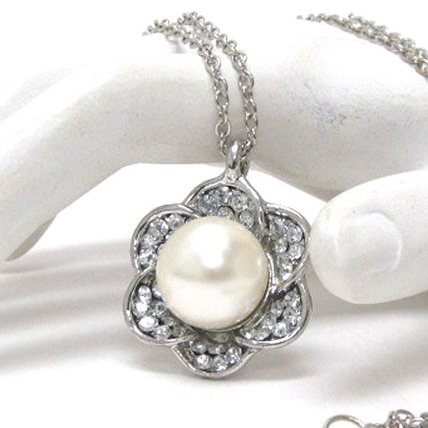 Crystal petal and center pearl flower pendant necklace