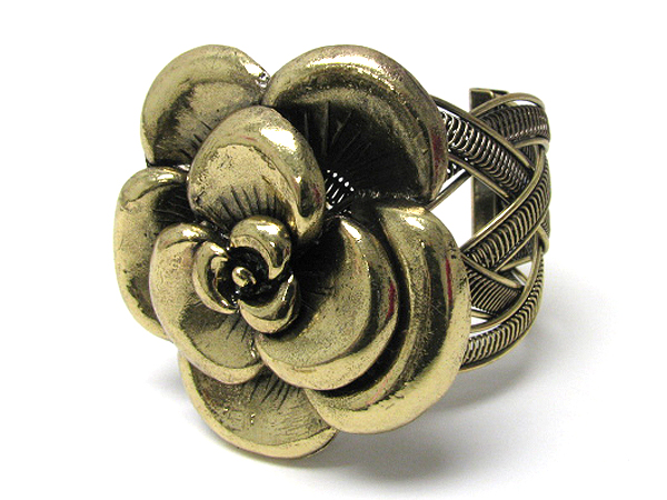 Large metal flower and woven metal stretch bracelet