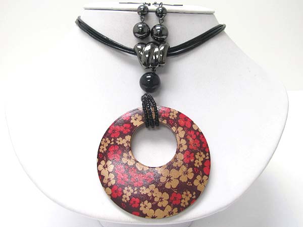 Flower print wood donut medallion cord necklace earring set