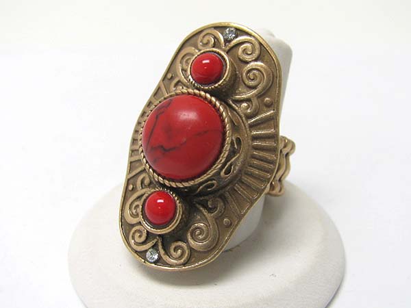 Triple coral stone long finger stretch ring