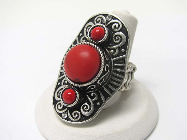 Triple coral stone long finger stretch ring