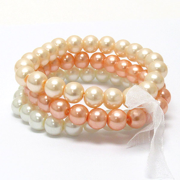 Bow tied three row pearl beads stretch bracelet