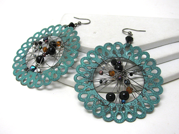 Large patina disk and wire and bead center deco earrings